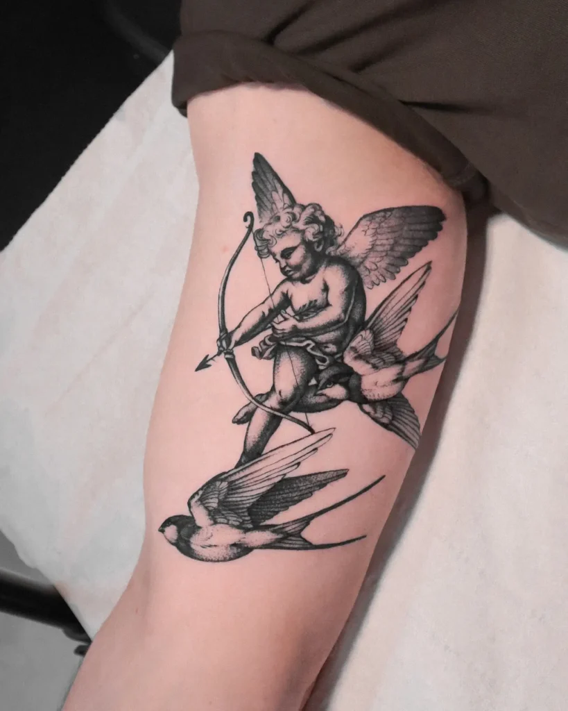 20. Cupid and Swallows Tattoo