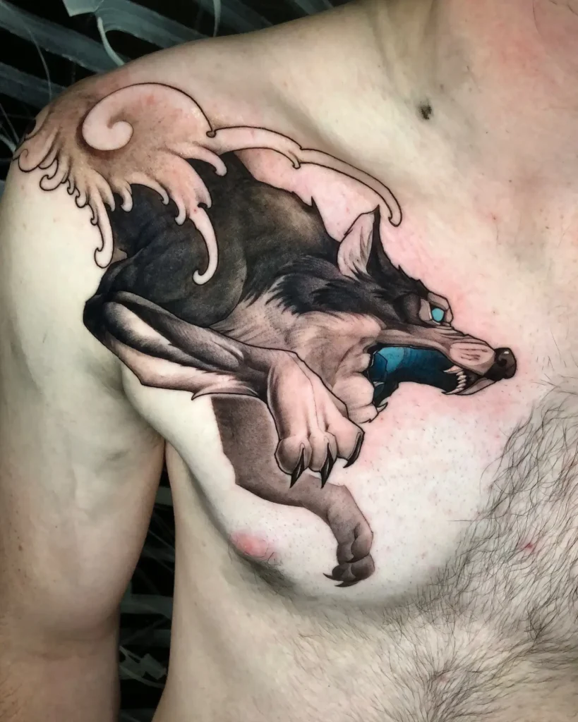 Chest tattoo for men featuring a stylized wolf with glowing eyes and sharp claws leaping forward, backed by swirling wave patterns; uses bold color contrast for dramatic, animated energy across the left pectoral.