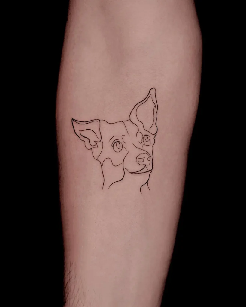Minimalist fine line dog portrait tattoo on the calf, featuring abstract contour lines and expressive eyes for a modern pet tribute.