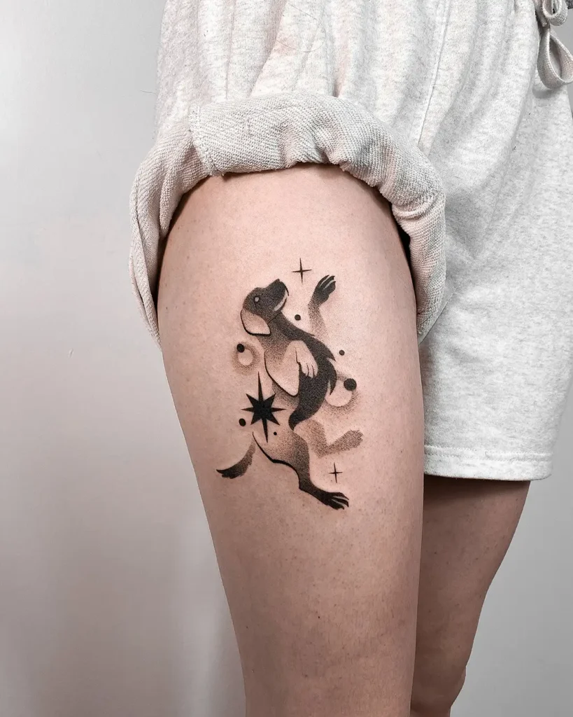 Abstract minimalist tattoo of a playful dog with black dots, stars, and swirling lines, placed on the thigh, perfect for fans of modern dog tattoo ideas minimalist.