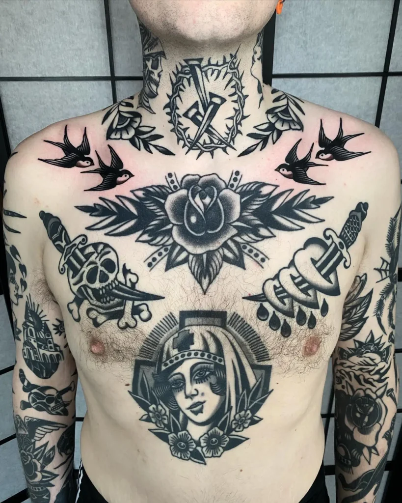 Traditional American flash chest tattoo for men featuring swallows, a rose, daggers, skulls, and a central nurse portrait; bold blackwork and strong outlines highlight vintage tattoo culture and symbolism.