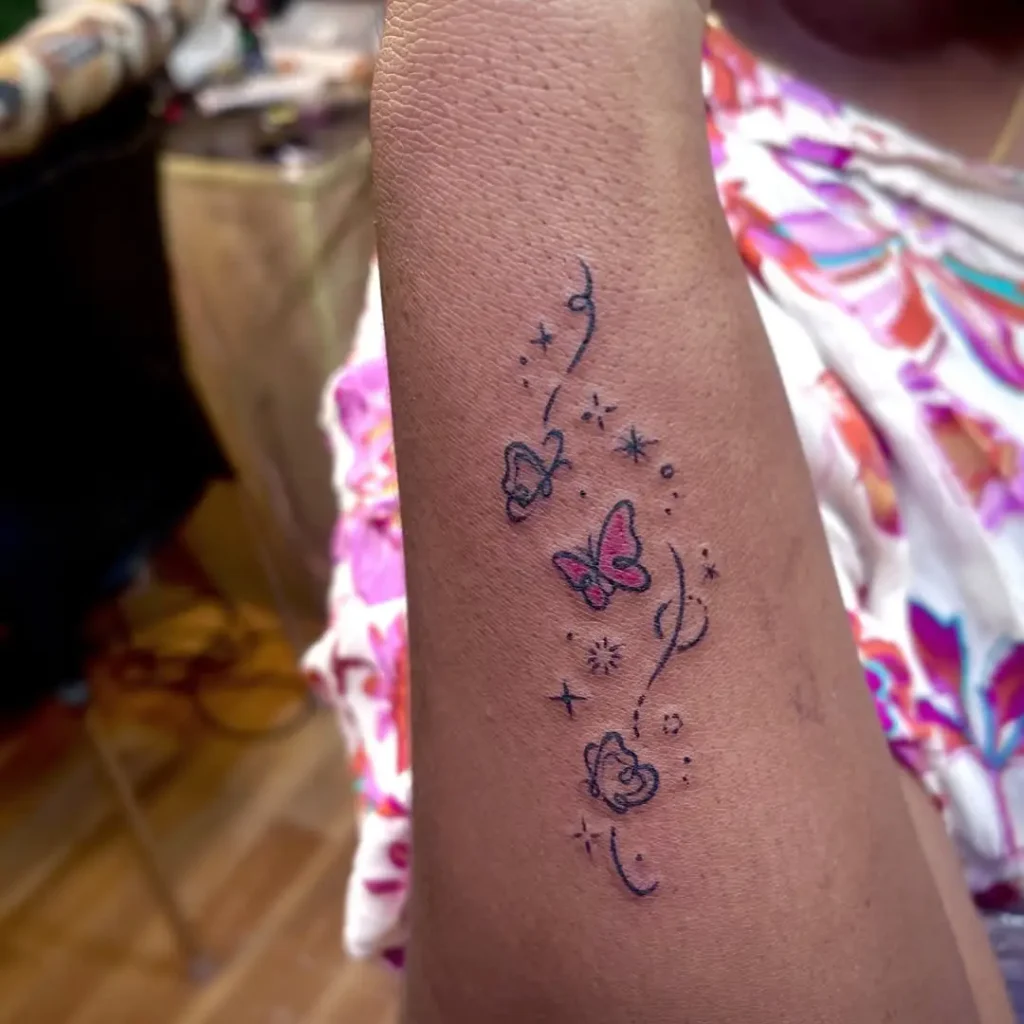 Butterfly with Stars or Sparkles Tattoo