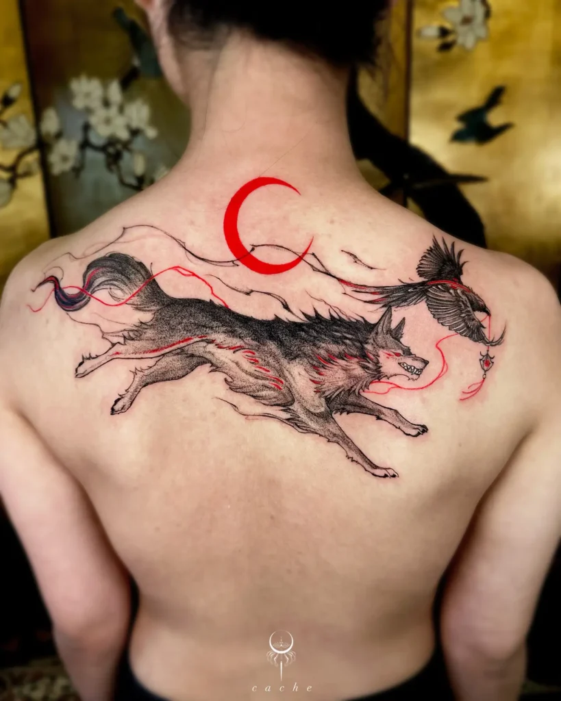 Large back tattoo of a black wolf and raven in motion, with flowing red ribbons and a bright red crescent moon above. Artistic fusion of mythology and wild nature. Designed in black and red ink, perfect for animal tattoo ideas sleeve-scale on the back. Symbolizes strength, transformation, and primal energy with bold visual impact.








