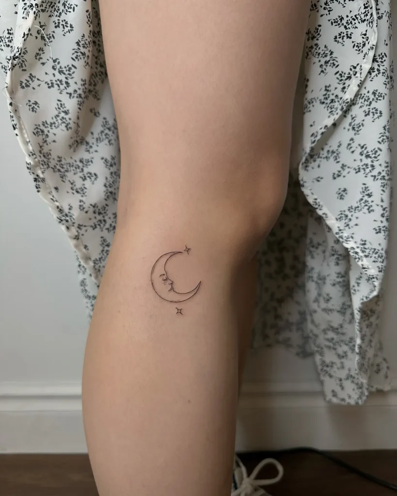 Fine line crescent moon tattoo with star accents, dot shading, and geometric linework, symbolizing cosmic balance and spiritual alignment.

