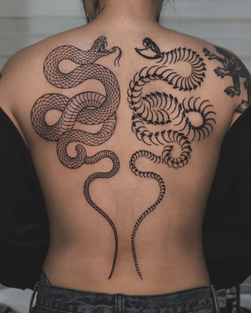 Snake and leaf back tattoo for women, symbolizing transformation, strength, and connection to nature

