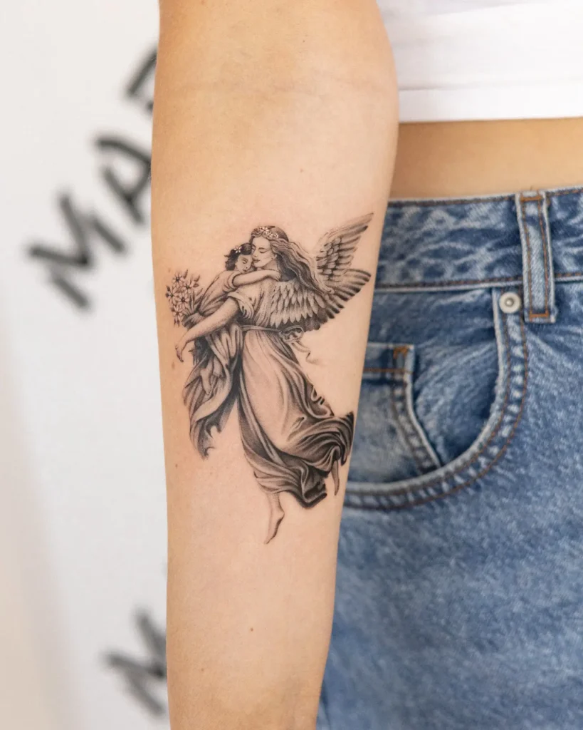 1. Tender Embrace Guardian Angel Tattoo