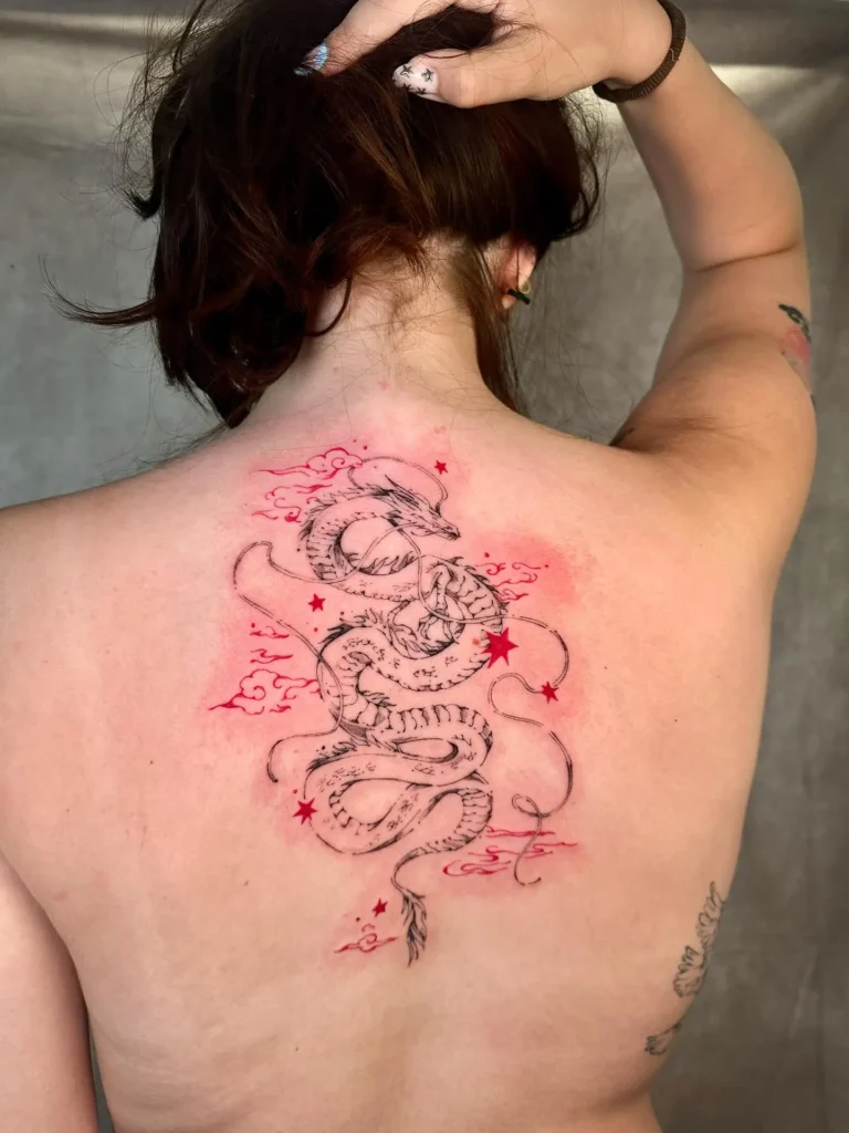 10. Red Star Dragon Spine Tattoo
