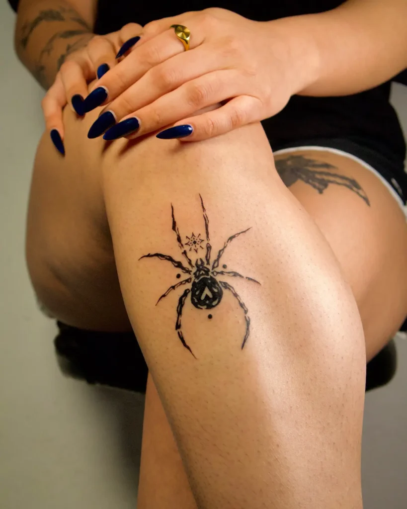 11. Celestial Spider Thigh Tattoo