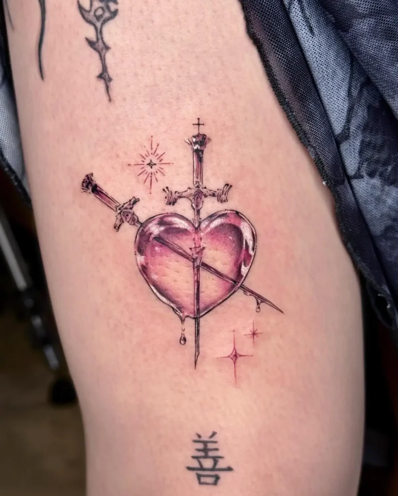 12. Crystal Heart with Swords Thigh Tattoo