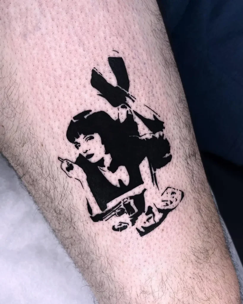 12. Pulp Fiction Stencil Tattoo