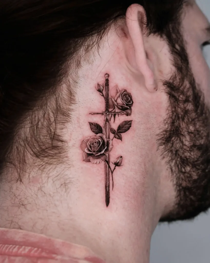 12. Sword and Roses Neck Tattoo