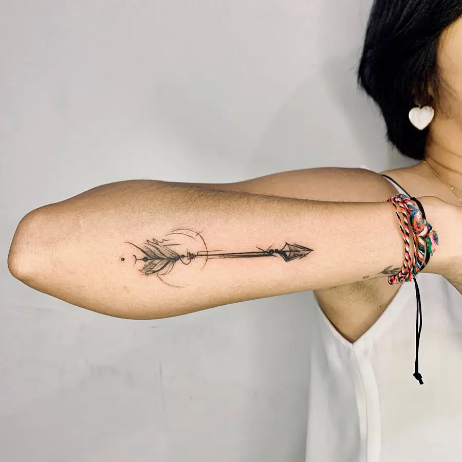 13. Abstract Fine-Line Arrow Tattoo on Arm