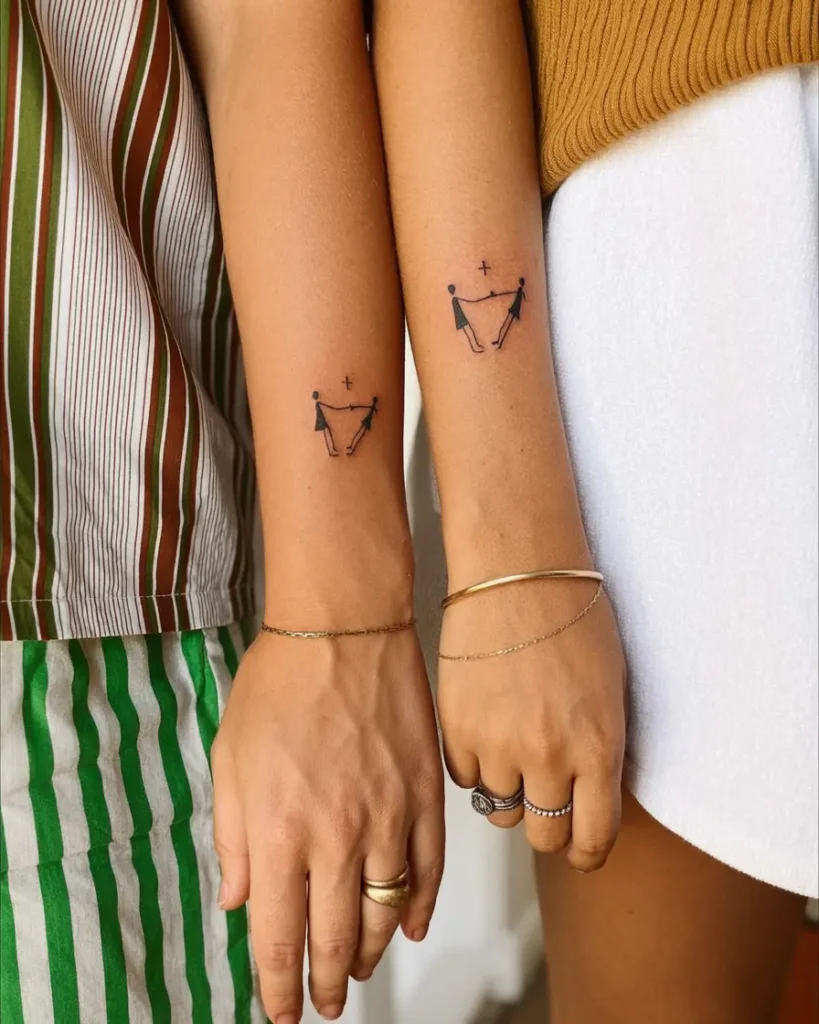 13. Connected Friendship Line Art Tattoo