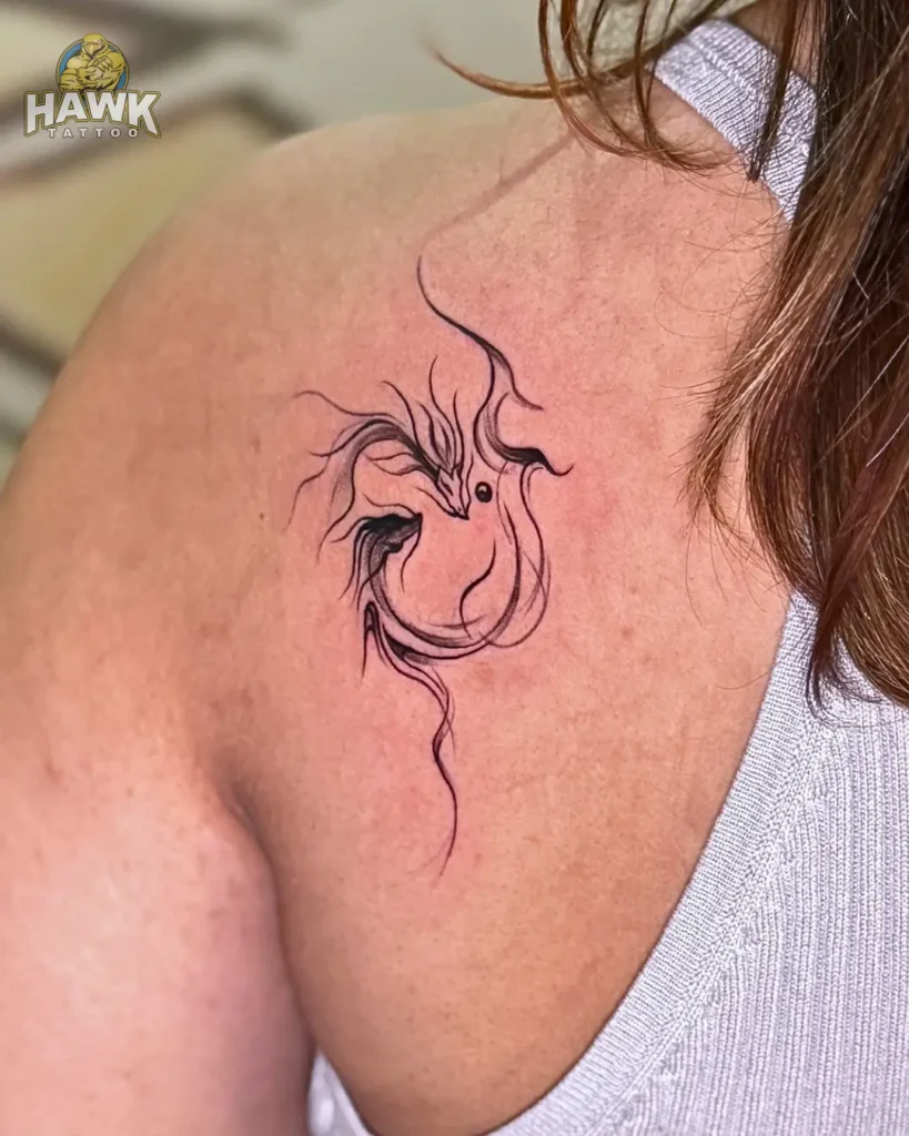13. Minimalist Dragon Shoulder Tattoo