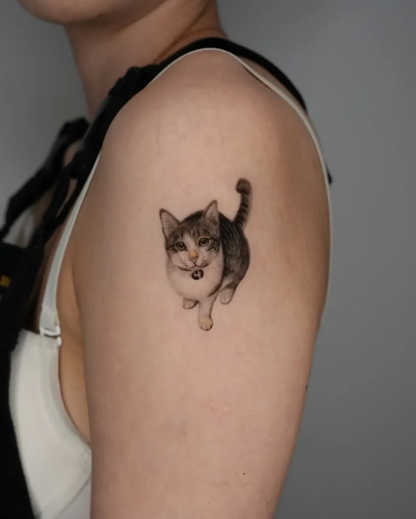 13. Realistic Walking Cat Tattoo