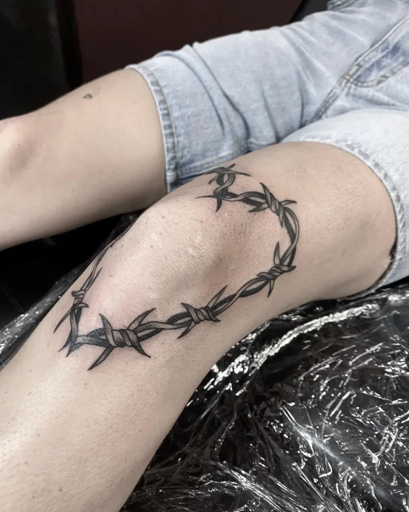 14. Barbed Wire Knee Wrap Tattoo
