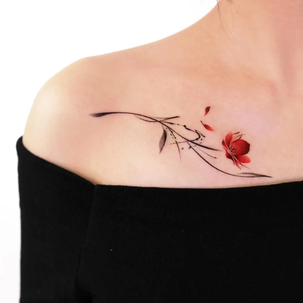 14. Delicate Red Bloom Collarbone Tattoo