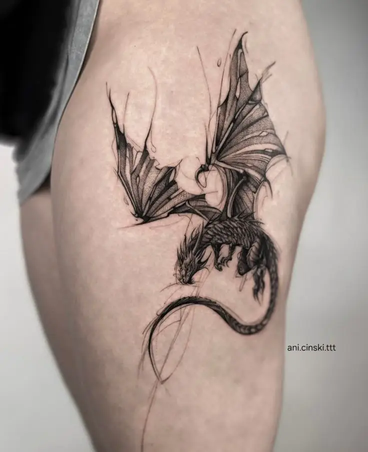 14. Flying Dragon Thigh Tattoo
