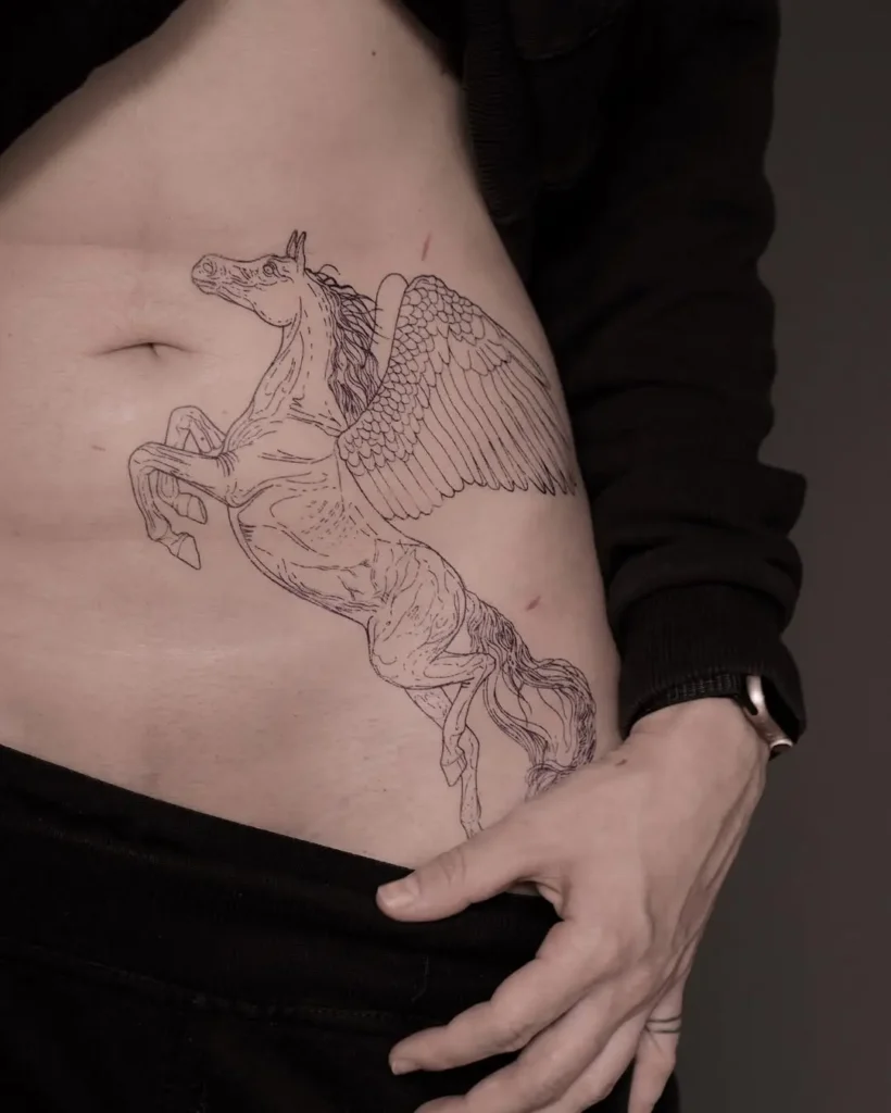 14. Pegasus Ribcage Stencil Tattoo