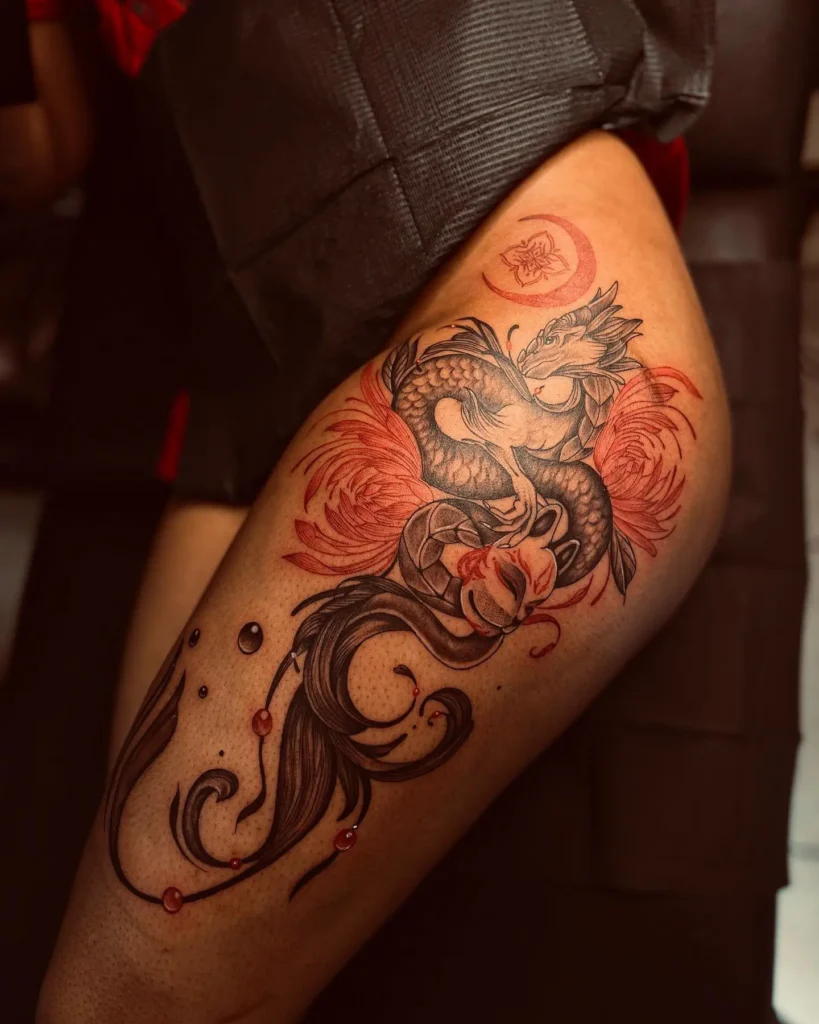 14. Red and Black Dragon Flow Tattoo