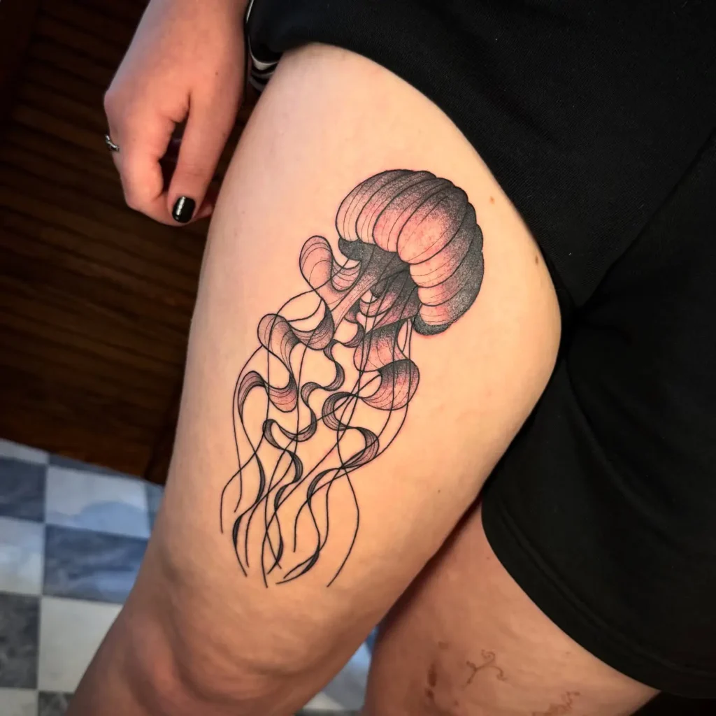 15. Ethereal Jellyfish Thigh Tattoo