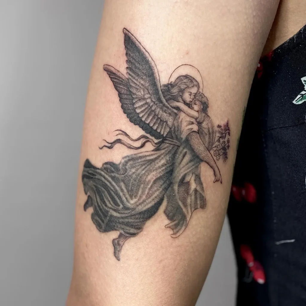15. Heavenly Embrace Guardian Angel Tattoo