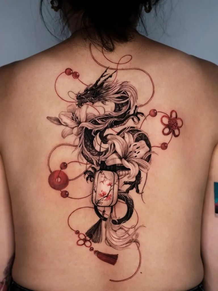 15. Ornamental Dragon Back Tattoo