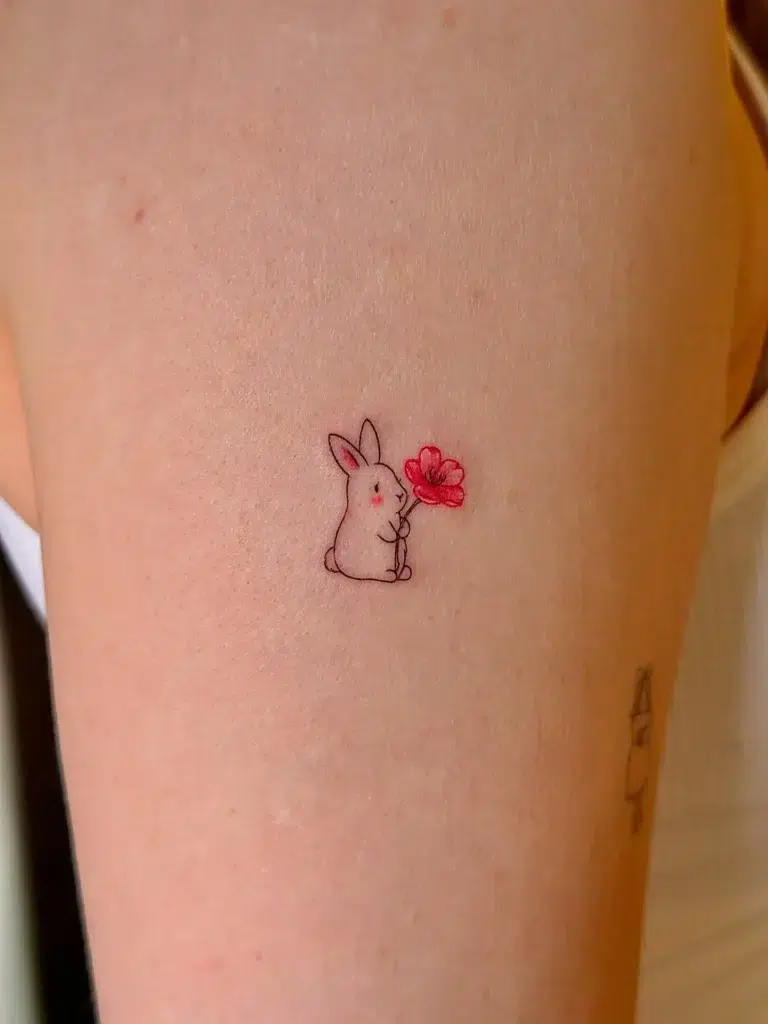 16. Tiny Bunny with Flower Tattoo