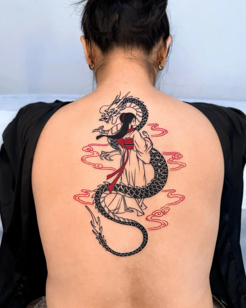 17. Dragon with Queen Back Tattoo