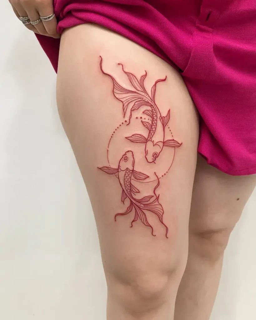 18. Twin Koi in Red Ink Thigh Tattoo
