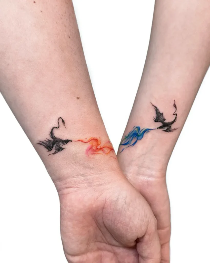 19. Fire and Ice Dragon Wrist Tattoos