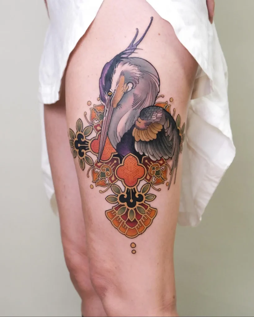 19. Heron with Ornamental Motif Thigh Tattoo