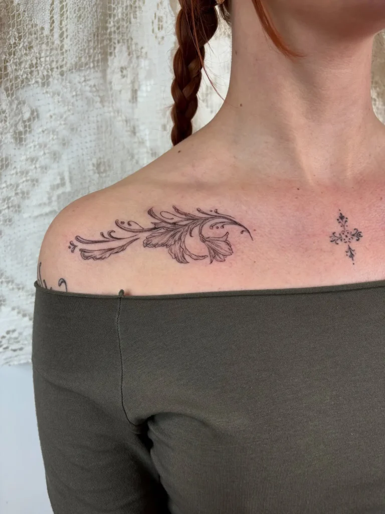 4. Ornamental Collarbone Tattoo