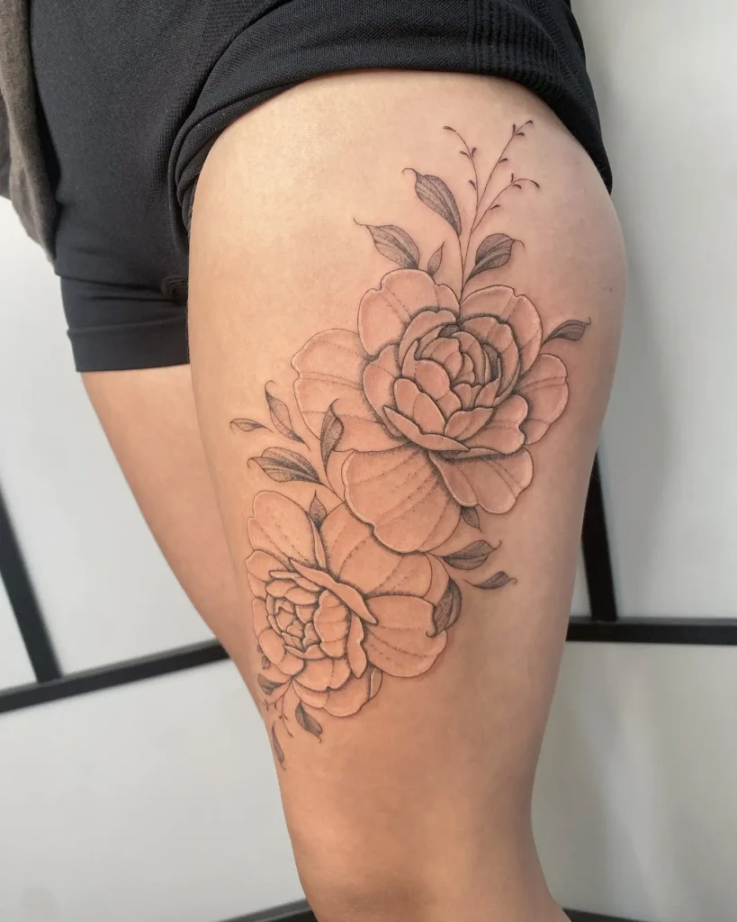 4. Soft Bloom Camellia Thigh Tattoo