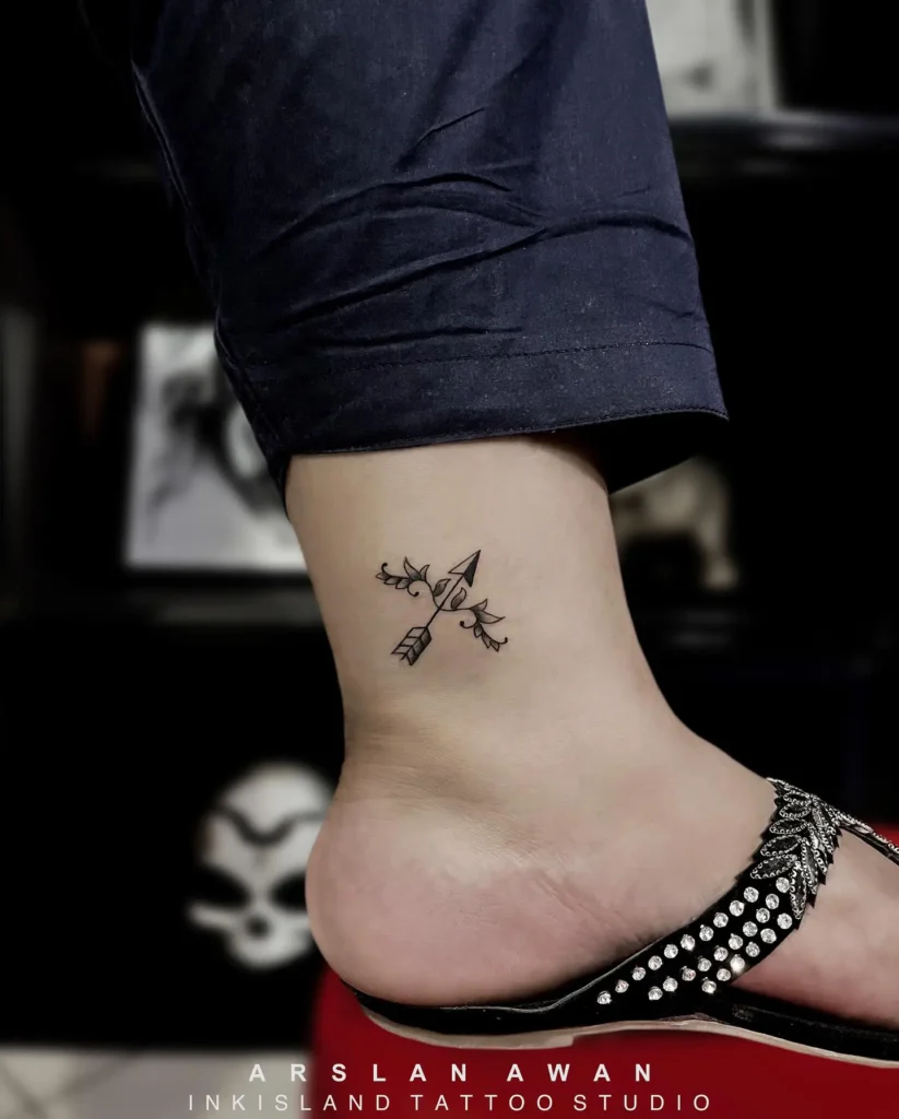 6. Minimal Crossed Arrows Ankle Tattoo
