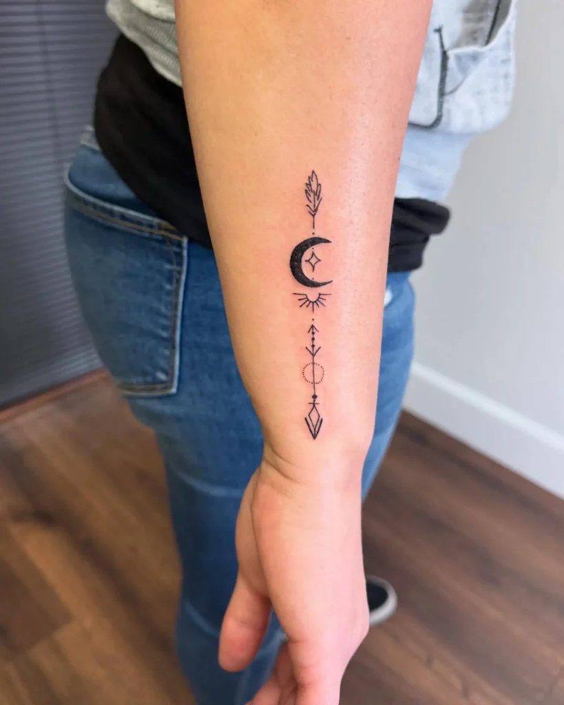 7. Celestial Arrow Forearm Tattoo