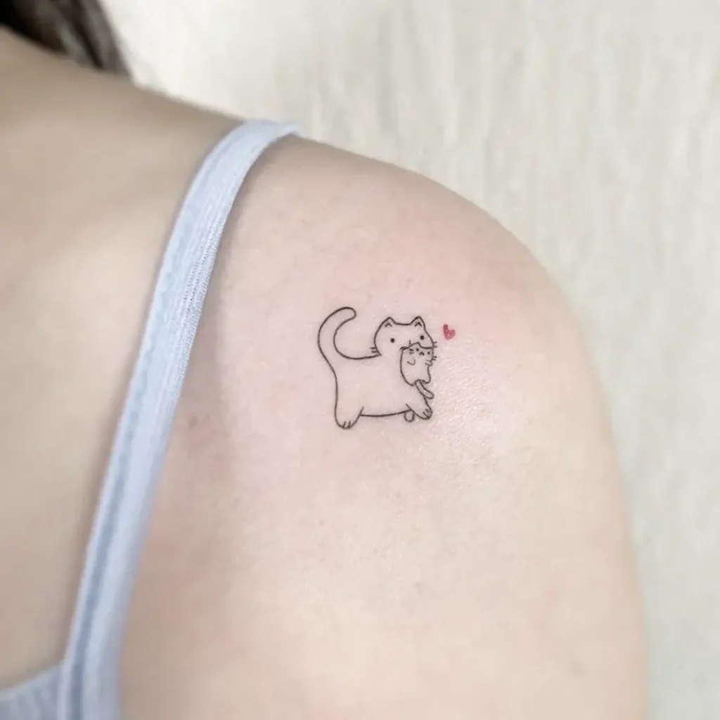 7. Playful Kitty with Heart Tattoo