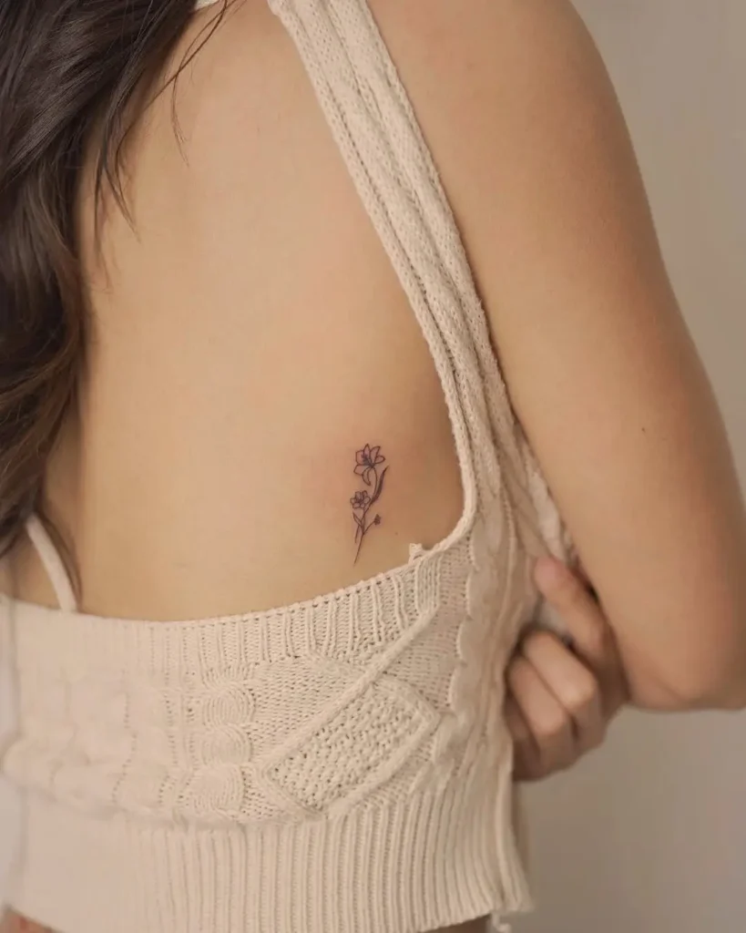 Wild Bloom Tattoo on the Rib