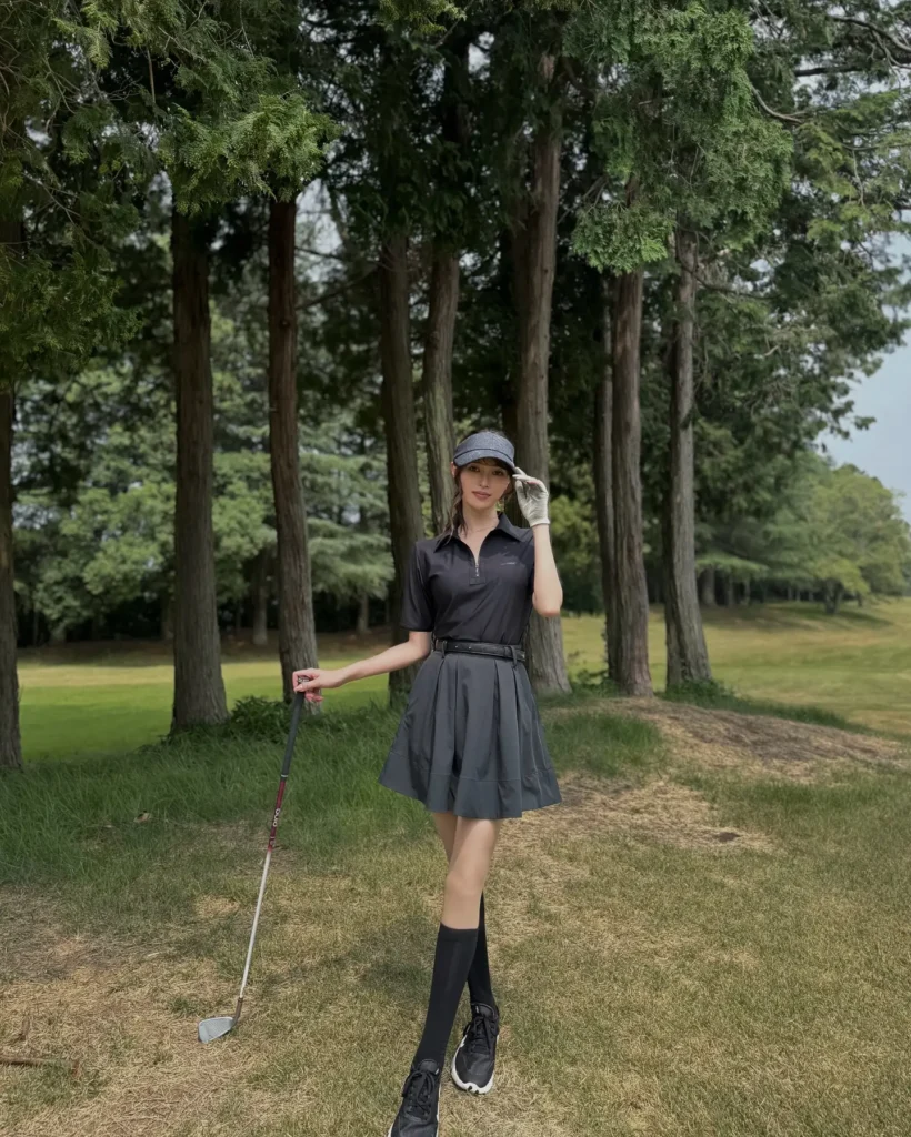 8. All-Black Chic with Pleated Power Skirt