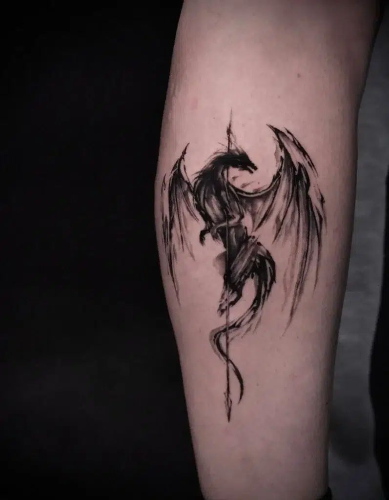 9. Dragon Wrapped Around Arrow Tattoo