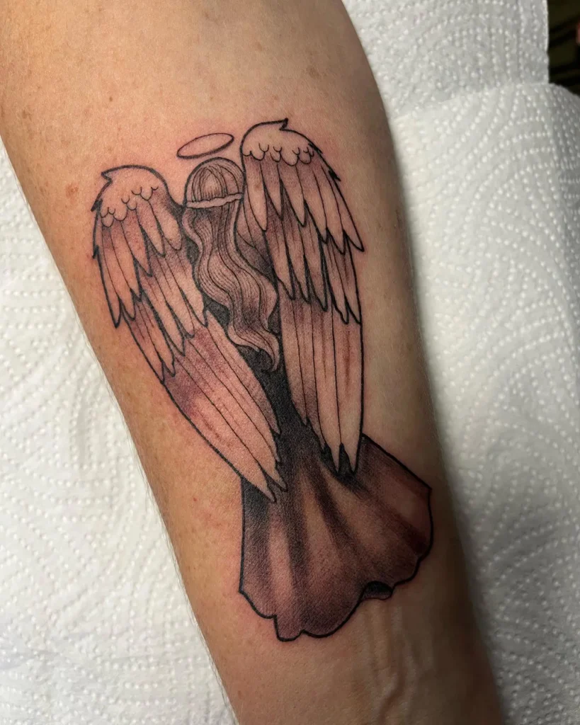 9. Hidden Guardian Angel Tattoo