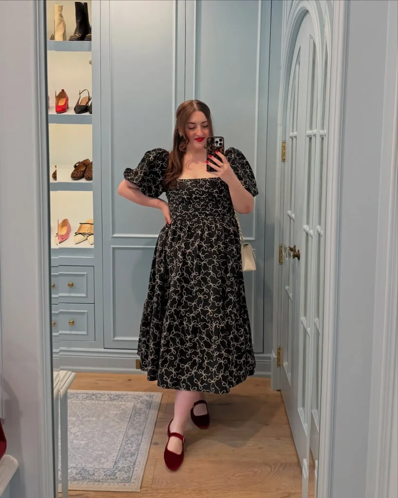 1. Vintage Charm in a Puff-Sleeve Christmas Dress