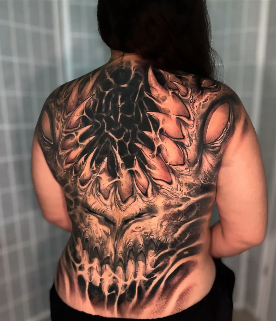 16. Bio-Organic Skull Back Tattoo Cover Up