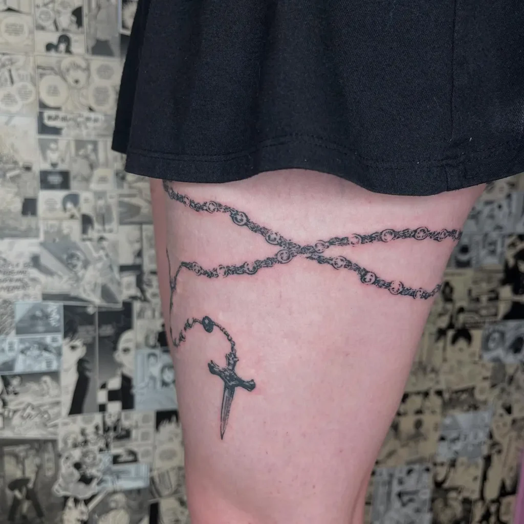 16. Chain Dagger Wrap – Thigh Y2K Tattoo