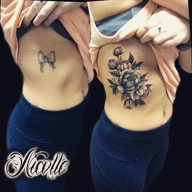 19. Floral Rib Tattoo Cover Up