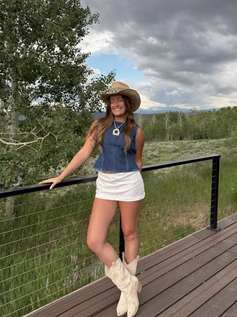 3. Denim Vest with Mini Skirt and Cowgirl Boots