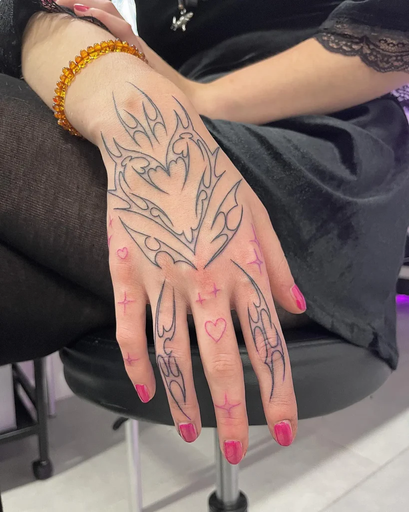 3. Flaming Heart Charm – Y2K Hand Tattoo