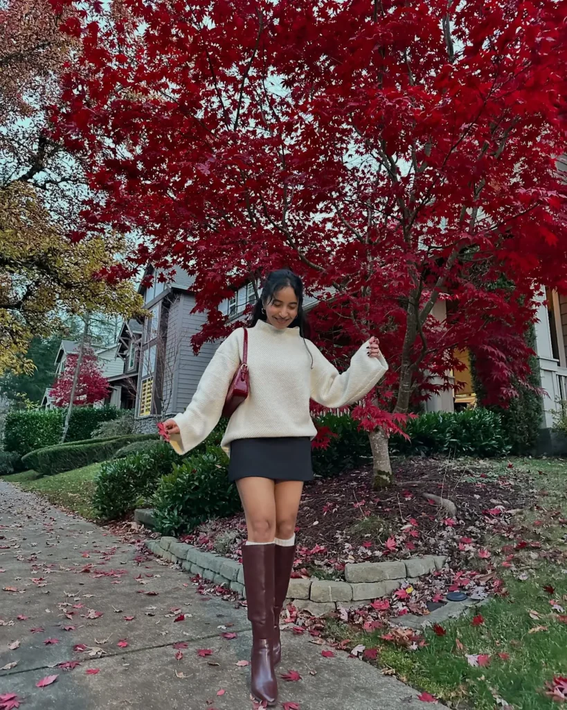 5. Oversized Sweater + Mini Skirt + Knee-High Boots