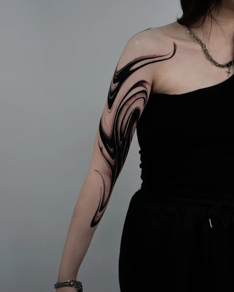 6. Abstract Swirl Arm Tattoo Cover Up