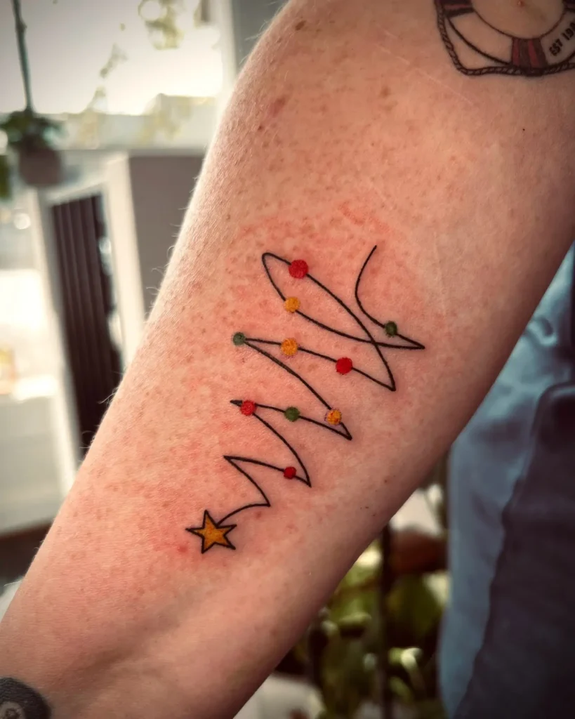 7. Minimalist Scribble Christmas Tree Tattoo